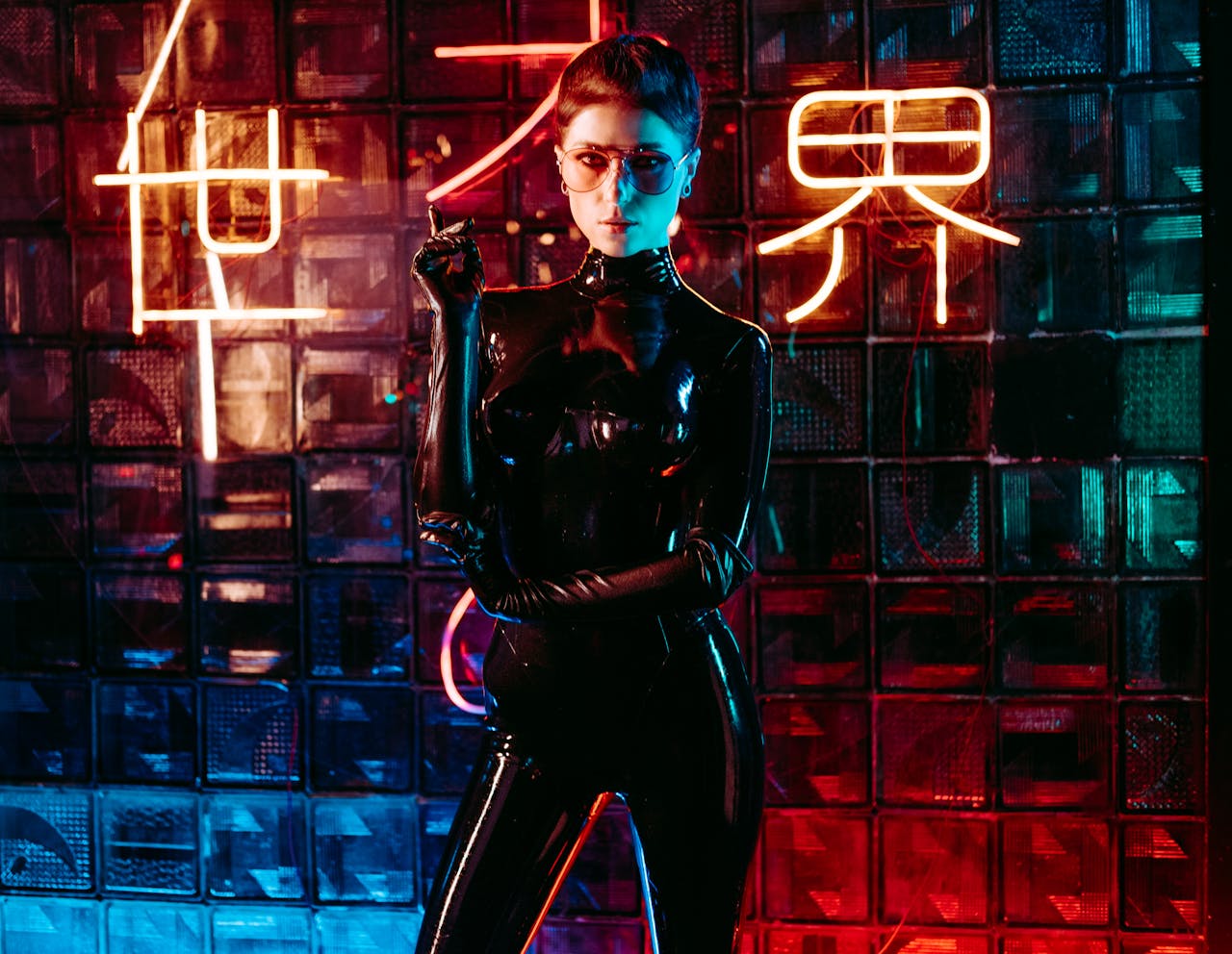 menu-04 A captivating portrait of a woman in a glossy latex suit with vibrant neon lighting.
